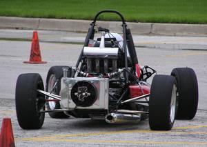 Jacking. Notice the rear tyre wear